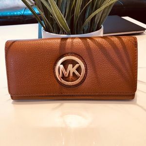 Michael Kors leather wallet.